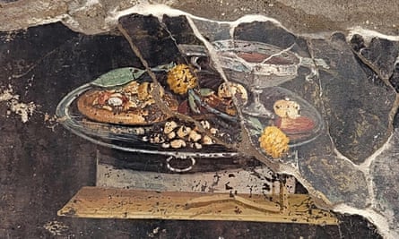 Una pintura pompeyana de 2000 años de antigüedad que muestra lo que podría ser un ancestro lejano de la pizza moderna